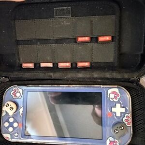 Nintendo Switch Lite With Carrying Case And 7 Games
